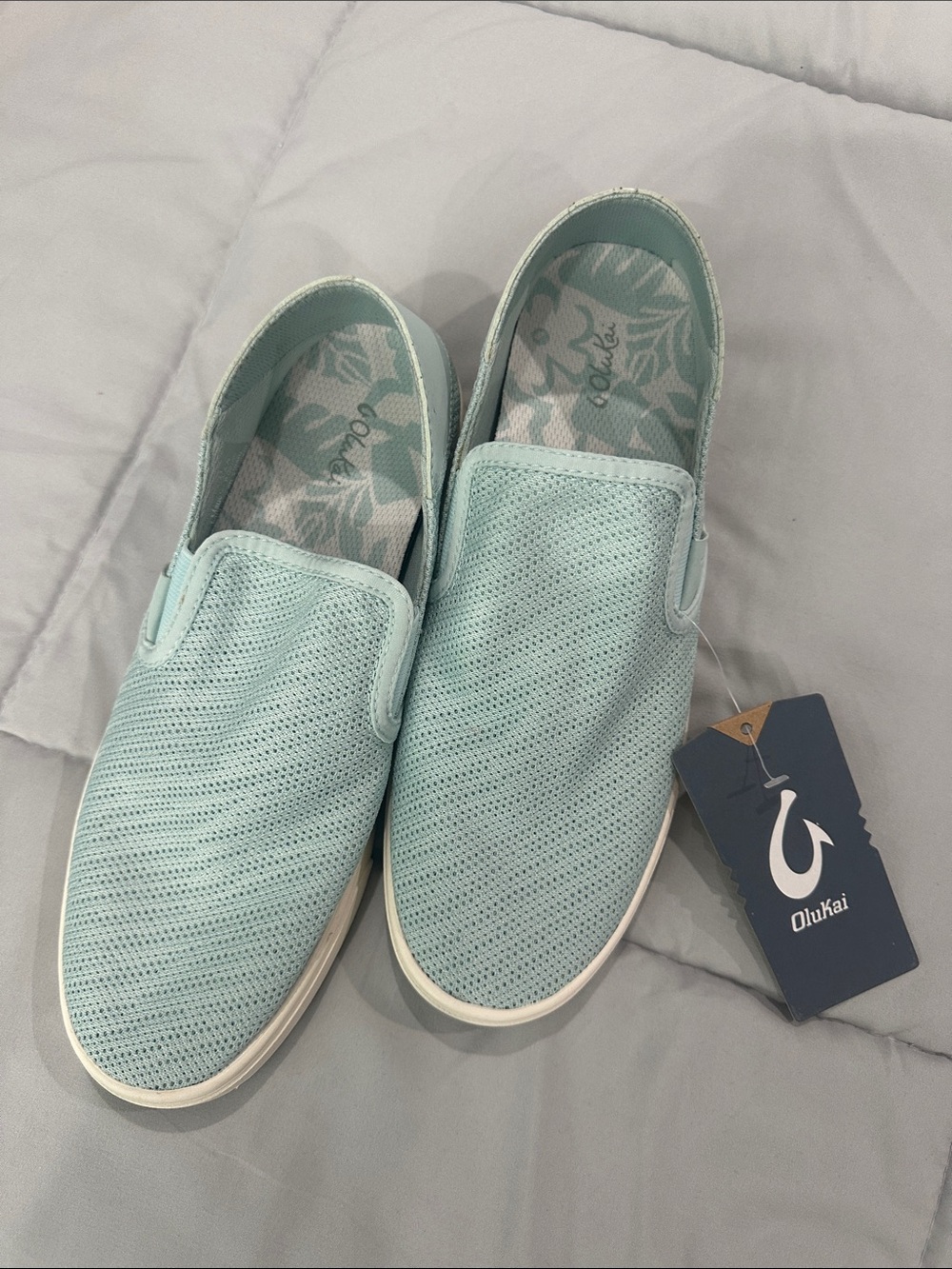 OluKai Women’s Slip-On Sneakers in Mint Blue